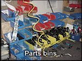 Parts bins on an assembly bench.